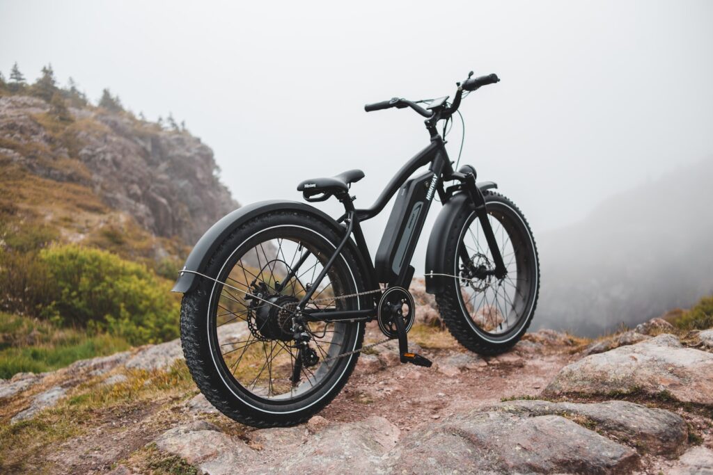 black and gray mountain ebike on brown ground during daytime